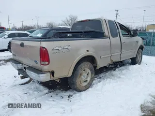 1998 Ford F-150 with VIN 1FTZX18W4WNB04665, listed as a IAAI auction lot 41255136 with 182,272 mi miles and . Bid and sale history available at DreamBid. Image 4.