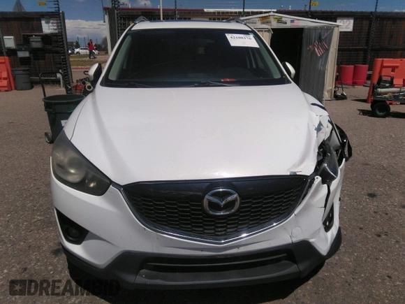 2014 Mazda CX-5 Touring with VIN JM3KE2CY7E0364311, listed as a IAAI auction lot 42108176 with 90,506 mi miles and . Bid and sale history available at DreamBid. Image 12.