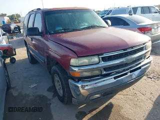 2004 Chevrolet Tahoe LS z VIN 1GNEC13VX4J112970, wystawiony jako IAAI lot #42380764 z przebiegiem 294 201 mil mil oraz . Historia ofert i sprzedaży dostępna na DreamBid. Obrazek 1.