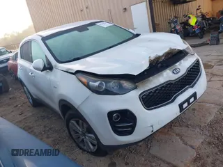 2018 Kia Sportage LX z VIN KNDPMCAC3J7394485, wystawiony jako IAAI lot #41106807 z przebiegiem 104 865 mil mil oraz . Historia ofert i sprzedaży dostępna na DreamBid. Obrazek 1.