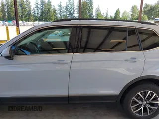 2018 Volkswagen Tiguan SEL z VIN 3VV2B7AX0JM197274, wystawiony jako IAAI lot #42392421 z przebiegiem 45 453 mil mil oraz . Historia ofert i sprzedaży dostępna na DreamBid. Obrazek 14.