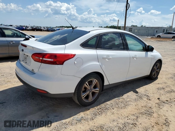 2017 Ford Focus SE with VIN 1FADP3FE9HL348123, listed as a Copart auction lot 64624965 with 58,650 mi miles and Clean title. Bid and sale history available at DreamBid. Image 3.