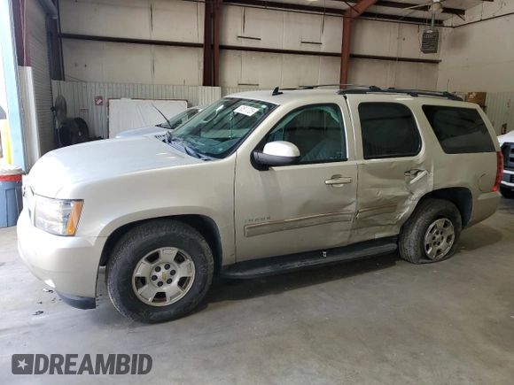 2013 Chevrolet Tahoe LS with VIN 1GNSCAE03DR212317, listed as a Copart auction lot 50511725 with 135,325 mi miles and Salvage title. Bid and sale history available at DreamBid. Image 1.