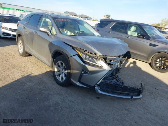 2017 Lexus RX with VIN 2T2BZMCA8HC094605, listed as a IAAI auction lot 41229579 with 125607 miles. Bid and sale history available at carsss.com. Image 1.