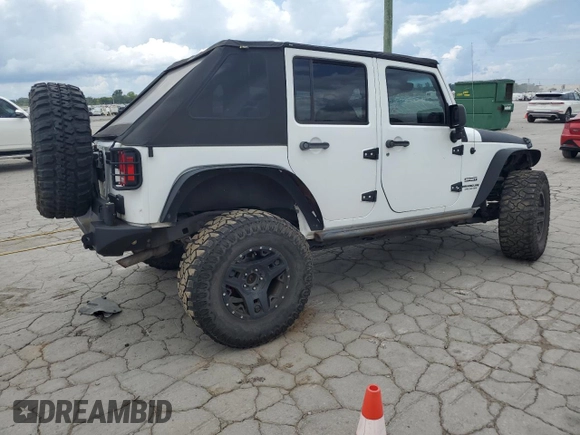 2015 Jeep Wrangler Unlimited Sport с VIN 1C4BJWDG3FL570131, выставлен на аукционе Copart как лот 64418415 с пробегом 112 362 миль миль и Списание • Salvage title. История ставок и продаж доступна на DreamBid. Изображение 3.
