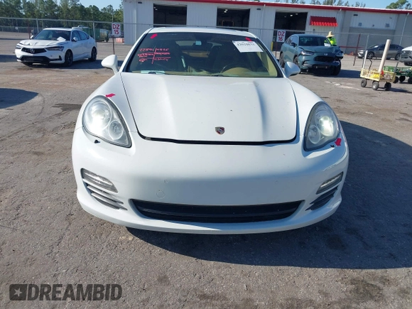 2013 Porsche Panamera with VIN WP0AA2A7XDL014047, listed as a IAAI auction lot 42010031 with 118,681 mi miles and . Bid and sale history available at DreamBid. Image 6.