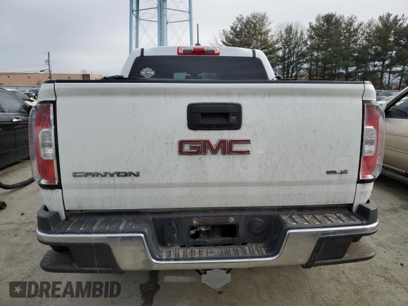 2015 GMC Canyon 4WD SLE with VIN 1GTG6BE31F1124583, listed as a Copart auction lot 45836545 with 212,014 mi miles and Salvage Title. Bid and sale history available at carsss.com. Image 6.