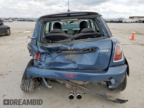 2010 MINI Hardtop S with VIN WMWMF7C51ATZ69061, listed as a Copart auction lot 60837465 with 102,506 mi miles and Salvage title. Bid and sale history available at DreamBid. Image 6.
