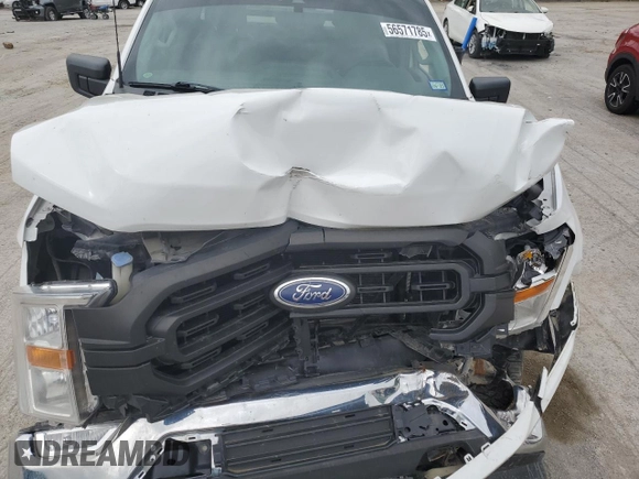 2021 Ford F-150 XL with VIN 1FTFX1E51MFC05216, listed as a Copart auction lot 56571785 with 94,584 mi miles and Salvage title. Bid and sale history available at DreamBid. Image 11.