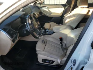2020 BMW X4 xDrive30i with VIN 5UX2V1C05L9B34564, listed as a Copart auction lot 70014203 with 0 mi miles. Bid and sale history available at carsss.com. Image 7.