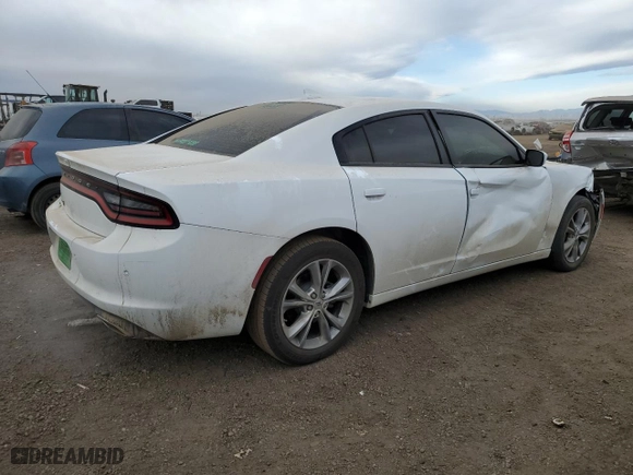 2022 Dodge Charger SXT with VIN 2C3CDXJG2NH221659, listed as a Copart auction lot 83803154 with 53,279 mi miles and Salvage Title. Bid and sale history available at carsss.com. Image 3.