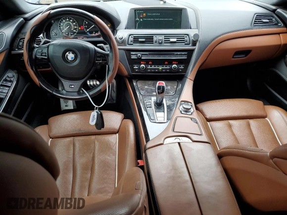 2013 BMW 6 Series 650i with VIN WBA6B2C50DD128242, listed as a Copart auction lot 44441885 with 107,960 mi miles and Salvage Title. Bid and sale history available at DreamBid. Image 8.