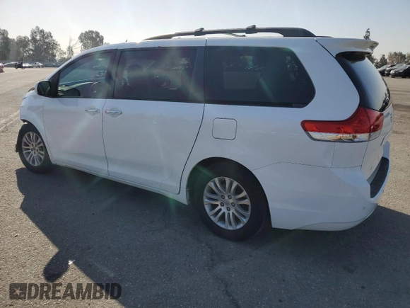 2013 Toyota Sienna XLE AAS with VIN 5TDYK3DC5DS322039, listed as a Copart auction lot 61657715 with 185,269 mi miles and Salvage title. Bid and sale history available at DreamBid. Image 2.