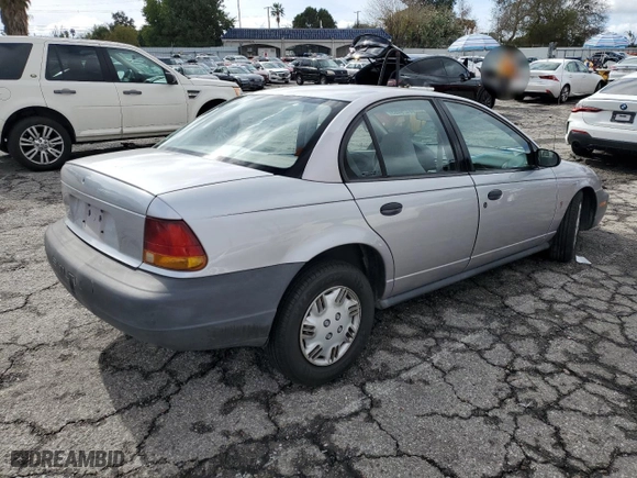 1996 Saturn SL with VIN 1G8ZH5288TZ156412, listed as a Copart auction lot 44429465 with 141,560 mi miles and Salvage Title. Bid and sale history available at carsss.com. Image 3.
