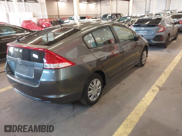 2010 Honda Insight LX with VIN JHMZE2H54AS040316, listed as a IAAI auction lot 41572246 with 142,850 mi miles and . Bid and sale history available at DreamBid. Image 4.