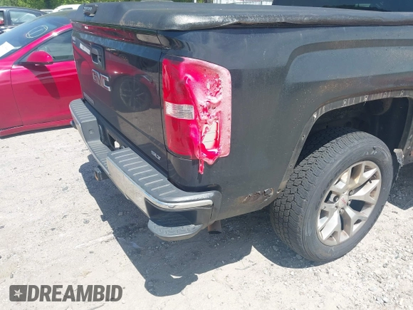 2015 GMC Sierra 1500 SLT with VIN 3GTU2VEC5FG200727, listed as a IAAI auction lot 42017160 with 191,201 mi miles and . Bid and sale history available at DreamBid. Image 17.