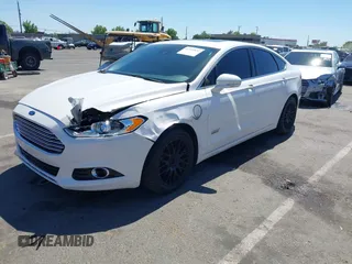 2016 Ford Fusion Titanium z VIN 3FA6P0SU2GR357508, wystawiony jako IAAI lot #42551834 z przebiegiem 177 425 mil mil oraz . Historia ofert i sprzedaży dostępna na DreamBid. Obrazek 17.