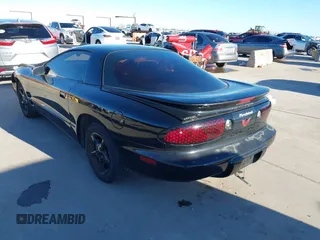 2002 Pontiac Firebird with VIN 2G2FS22K022109417, listed as a IAAI auction lot 41199057 with 124,463 mi miles. Bid and sale history available at carsss.com. Image 3.