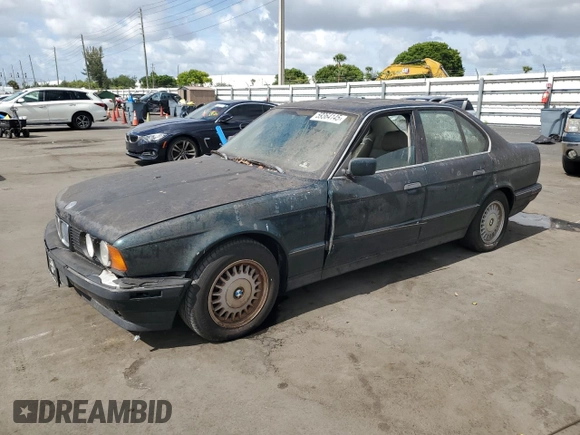 1994 BMW 5 Series 525i z VIN WBAHD632XRGK40231, wystawiony jako Copart lot #59364145 z przebiegiem Nie podano mil oraz Czysty tytuł • Clean title. Historia ofert i sprzedaży dostępna na DreamBid. Obrazek 1.