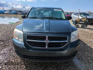2008 Dodge Caliber SXT with VIN 1B3HB48B58D582130, listed as a Copart auction lot 49707155 with 155,347 mi miles and Salvage Title. Bid and sale history available at DreamBid. Image 5.