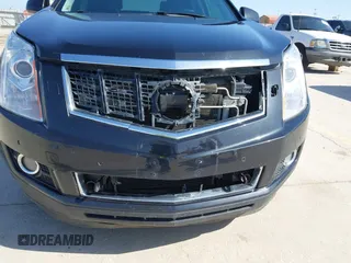 2013 Cadillac SRX Performance Collection with VIN 3GYFNHE35DS548632, listed as a IAAI auction lot 41990670 with 98,659 mi miles. Bid and sale history available at carsss.com. Image 6.