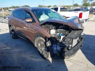 2016 Hyundai Tucson Limited with VIN KM8J33A29GU105194, listed as a IAAI auction lot 41214305 with 65,452 mi miles. Bid and sale history available at carsss.com. Image 1.