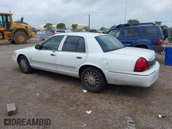 2009 Mercury Grand Marquis LS with VIN 2MEHM75V99X623036, listed as a IAAI auction lot 42087957 with 208,652 mi miles. Bid and sale history available at carsss.com. Image 3.
