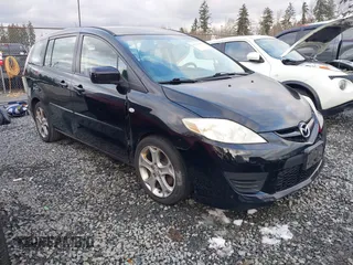 2009 Mazda 5 Sport with VIN JM1CR29LX90353449, listed as a IAAI auction lot 41522186 with 149,160 mi miles and . Bid and sale history available at DreamBid. Image 1.