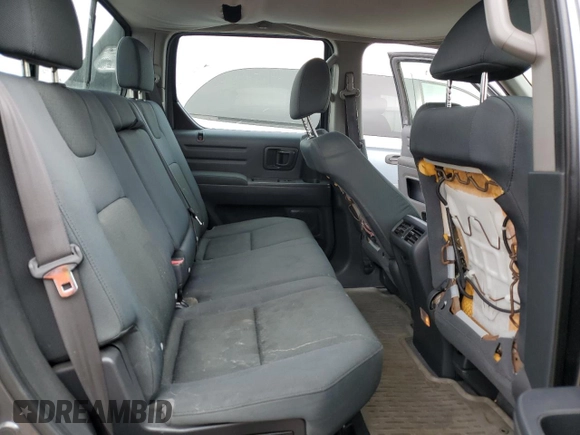 2011 Honda Ridgeline RT z VIN 5FPYK1F26BB451960, wystawiony jako Copart lot #53733215 z przebiegiem 202 556 mil mil oraz Szkody całkowita. Historia ofert i sprzedaży dostępna na DreamBid. Obrazek 10.