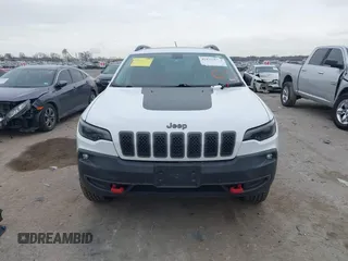 2019 Jeep Cherokee Trailhawk with VIN 1C4PJMBN6KD124023, listed as a IAAI auction lot 41432217 with 76,934 mi miles and . Bid and sale history available at DreamBid. Image 13.