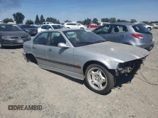 1998 BMW M3 with VIN WBSCD0321WEE13163, listed as a Copart auction lot 68702814 with Not provided miles and Clean title. Bid and sale history available at DreamBid. Image 4.