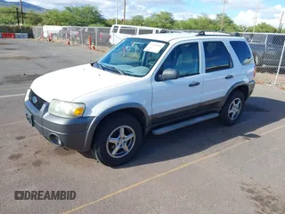 2006 Ford Escape XLT with VIN 1FMCU03116KA05836, listed as a IAAI auction lot 42310284 with 128,620 mi miles and . Bid and sale history available at DreamBid. Image 2.