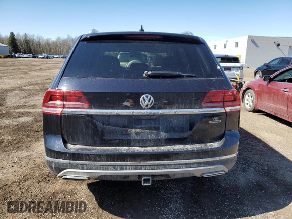 2018 Volkswagen Atlas 3.6L V6 SEL with VIN 1V2MR2CA2JC566795, listed as a Copart auction lot 49963295 with 132,307 mi miles and Salvage Title. Bid and sale history available at carsss.com. Image 6.