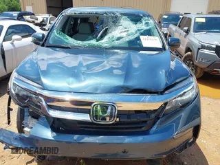 2022 Honda Pilot EX-L с VIN 5FNYF6H53NB023298, выставлен на аукционе IAAI как лот 42255379 с пробегом 38 382 миль миль и . История ставок и продаж доступна на DreamBid. Изображение 6.