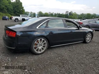 2014 Audi A8 4.0T with VIN WAUR2AFD5EN003923, listed as a Copart auction lot 65389025 with 97,833 mi miles and Salvage title. Bid and sale history available at DreamBid. Image 3.