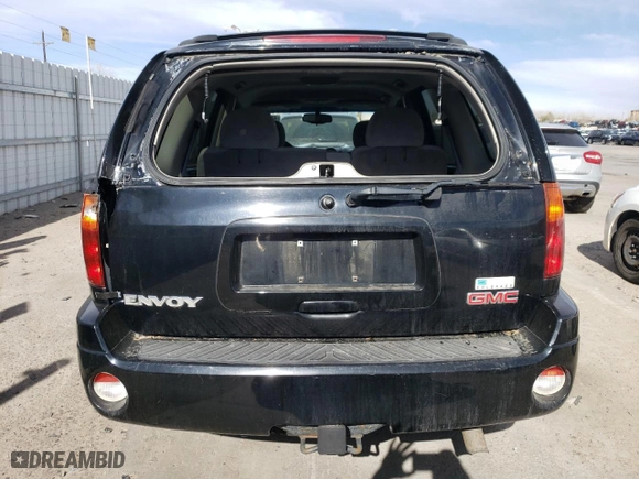 2005 GMC Envoy SLE with VIN 1GKDT13S952201133, listed as a Copart auction lot 48504025 with 200,240 mi miles and Salvage Title. Bid and sale history available at carsss.com. Image 6.