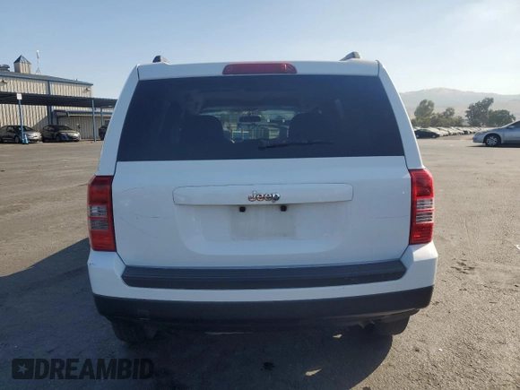 2014 Jeep Patriot Sport with VIN 1C4NJPBA1ED545853, listed as a Copart auction lot 64324345 with 189,302 mi miles and Salvage title. Bid and sale history available at DreamBid. Image 6.