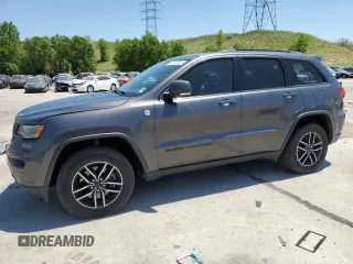 2020 Jeep Grand Cherokee Trailhawk with VIN 1C4RJFLT8LC177606, listed as a Copart auction lot 61678385 with 127,421 mi miles and Salvage title. Bid and sale history available at DreamBid. Image 1.
