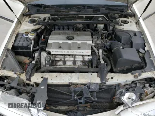 1997 Cadillac Seville Luxury SLS z VIN 1G6KS52Y0VU819998, wystawiony jako Copart lot #55979335 z przebiegiem 87 054 mil mil oraz Szkoda całkowita • Salvage title. Historia ofert i sprzedaży dostępna na DreamBid. Obrazek 11.