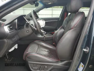 2022 Genesis G70 3.3T with VIN KMTG54TEXNU083193, listed as a Copart auction lot 56627395 with 16,980 mi miles and Salvage title. Bid and sale history available at DreamBid. Image 7.