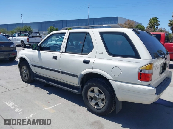 1999 Isuzu Rodeo S z VIN 4S2CM58WXX4347611, wystawiony jako IAAI lot #42351641 z przebiegiem 256 007 mil mil oraz . Historia ofert i sprzedaży dostępna na DreamBid. Obrazek 3.