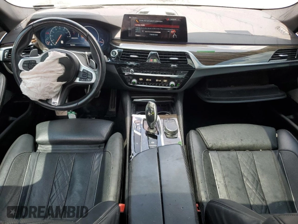 2019 BMW 5 Series M550i xDrive with VIN WBAJB9C53KB289356, listed as a Copart auction lot 57814535 with 60,454 mi miles and Clean title. Bid and sale history available at DreamBid. Image 8.