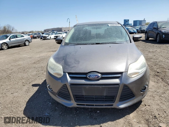 2012 Ford Focus SE with VIN 1FAHP3F23CL243982, listed as a Copart auction lot 52801055 with 143,695 mi miles and Salvage Title. Bid and sale history available at carsss.com. Image 5.