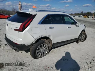2022 Cadillac XT4 FWD Premium Luxury with VIN 1GYFZCR45NF100049, listed as a Copart auction lot 87232634 with 62,391 mi miles and Salvage title. Bid and sale history available at DreamBid. Image 3.