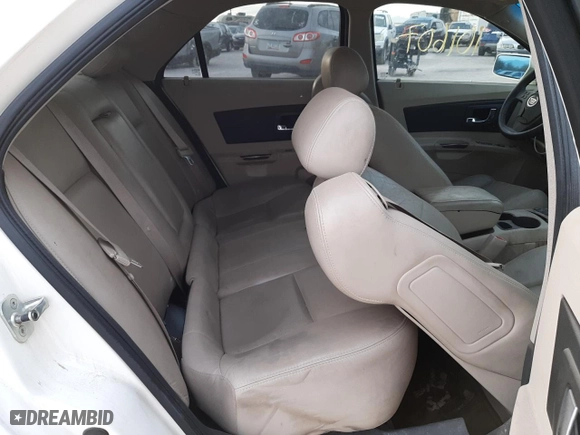 2005 Cadillac CTS with VIN 1G6DP567350180521, listed as a Copart auction lot 65447781 with 101,607 mi miles and Salvage Title. Bid and sale history available at carsss.com. Image 6.