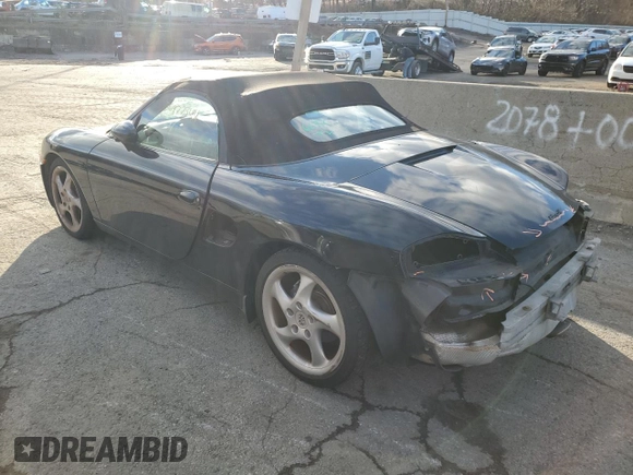 2000 Porsche Boxster z VIN WP0CA2980YU626358, wystawiony jako Copart lot #36977344 z przebiegiem 117 561 mil mil oraz Szkoda całkowita • Salvage title. Historia ofert i sprzedaży dostępna na DreamBid. Obrazek 2.