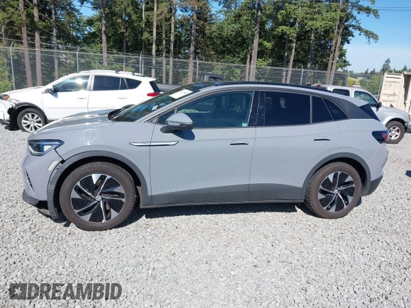 2021 Volkswagen ID.4 Pro S z VIN WVGTMPE20MP058882, wystawiony jako IAAI lot #42317440 z przebiegiem 64 473 mil mil oraz . Historia ofert i sprzedaży dostępna na DreamBid. Obrazek 14.