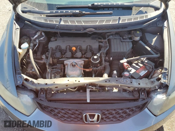2010 Honda Civic Cpe LX with VIN 2HGFG1B61AH529839, listed as a Copart auction lot 69501724 with 218,443 mi miles and Salvage Title. Bid and sale history available at carsss.com. Image 11.