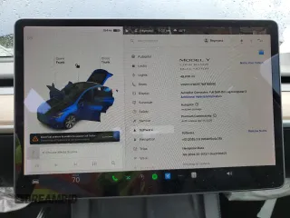 2021 Tesla Model Y Long Range with VIN 5YJYGDEE7MF160510, listed as a Copart auction lot 51098925 with 48,038 mi miles and Salvage Title. Bid and sale history available at DreamBid. Image 9.