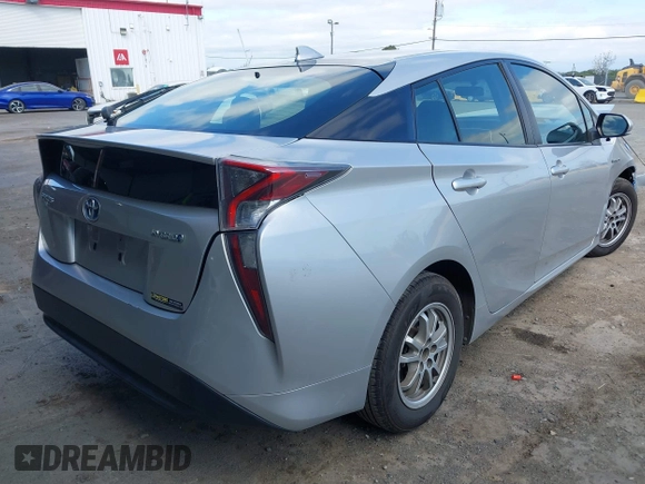2016 Toyota Prius Two with VIN JTDKBRFU3G3005025, listed as a IAAI auction lot 41893173 with 152,130 mi miles and . Bid and sale history available at DreamBid. Image 4.